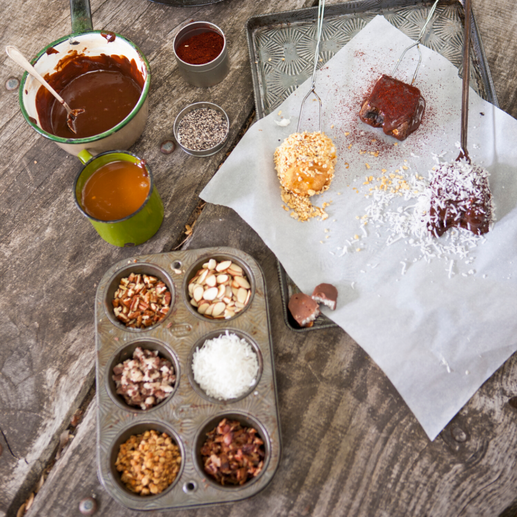 A tray of s'more toppings with roasted marshmallow.