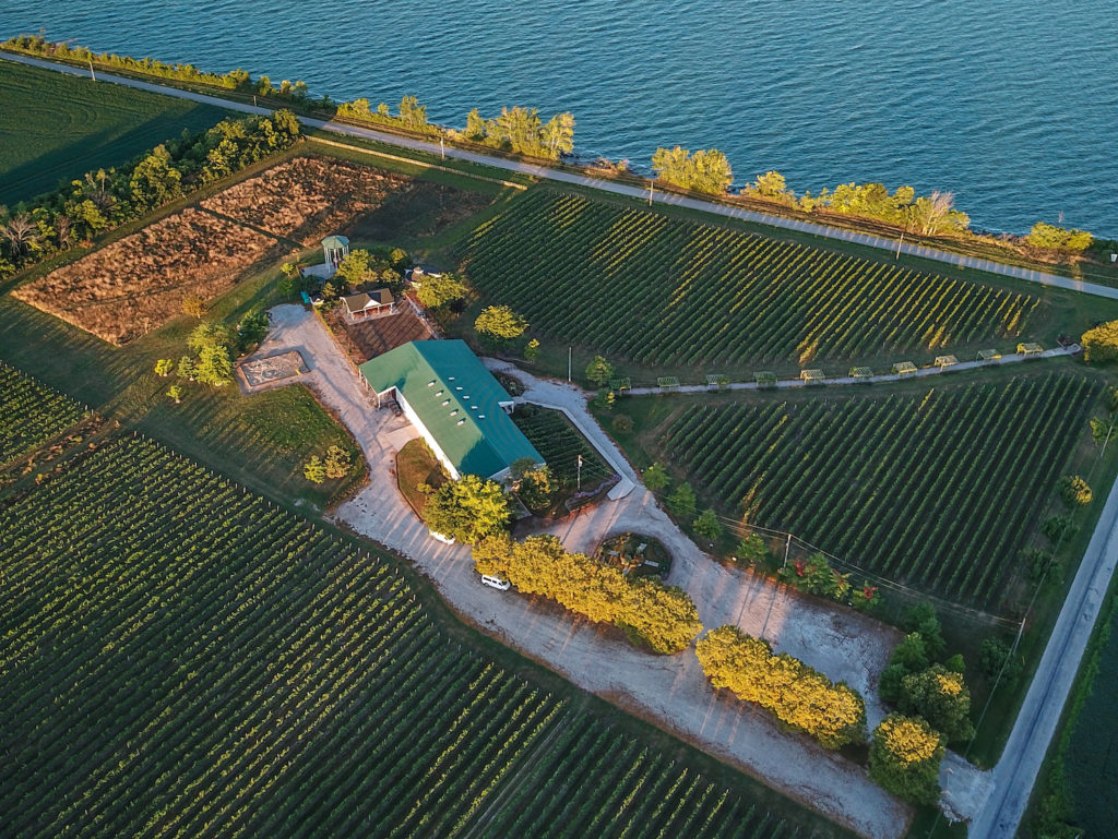 Pelee Island Winery Pavilion on Pelee Island, Ontario Canada arial shot with sustainable vineyards and Lake Erie. Taken by Ian Virtue.