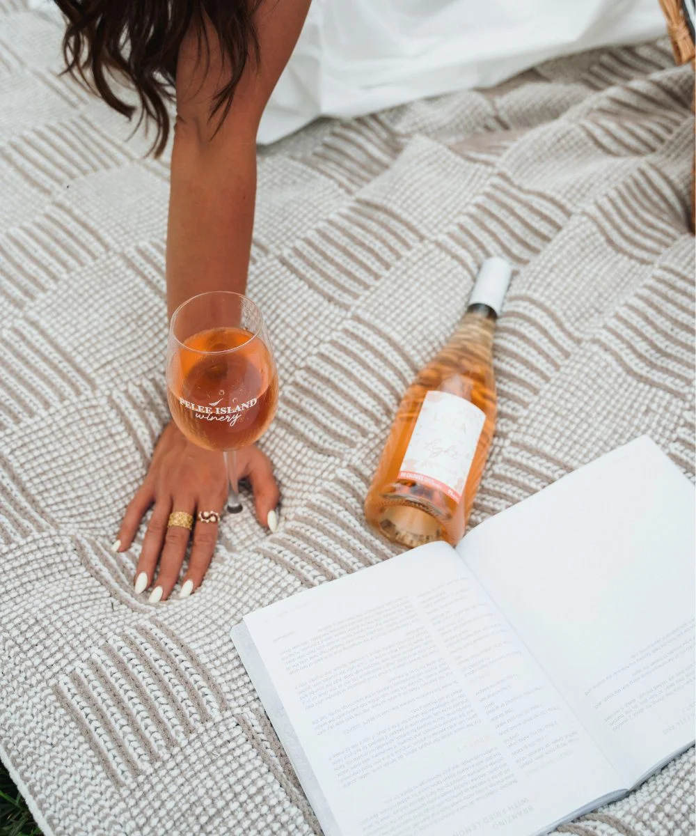 LOLA Light Rose with the Wine Glass, book while in outside Picnic