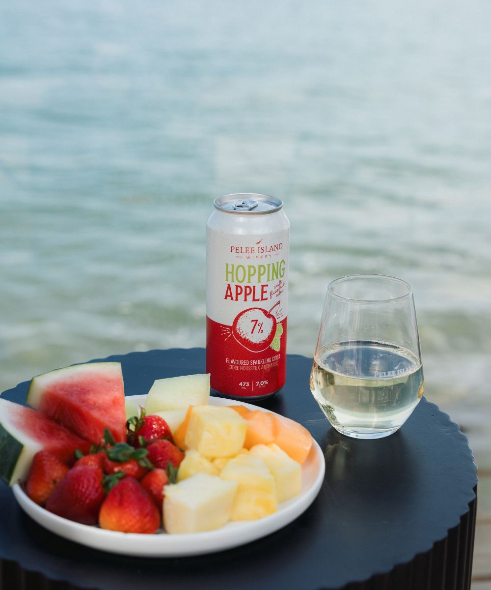 Hopping Apple with the Wine glass and Fresh Fruits