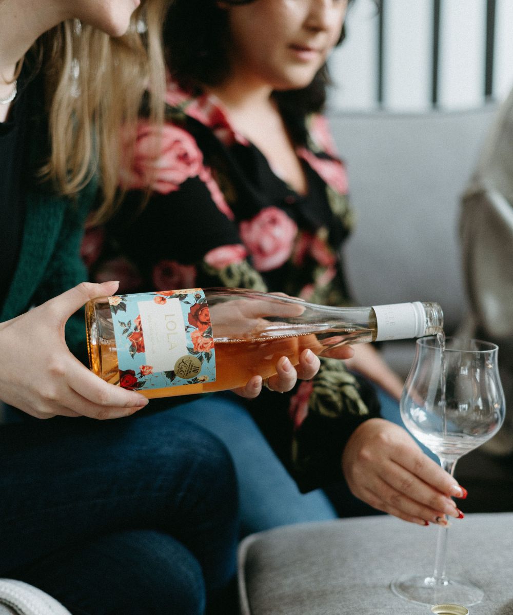 Lola Light Rose Original Label pour the Bottle to Wine Glass