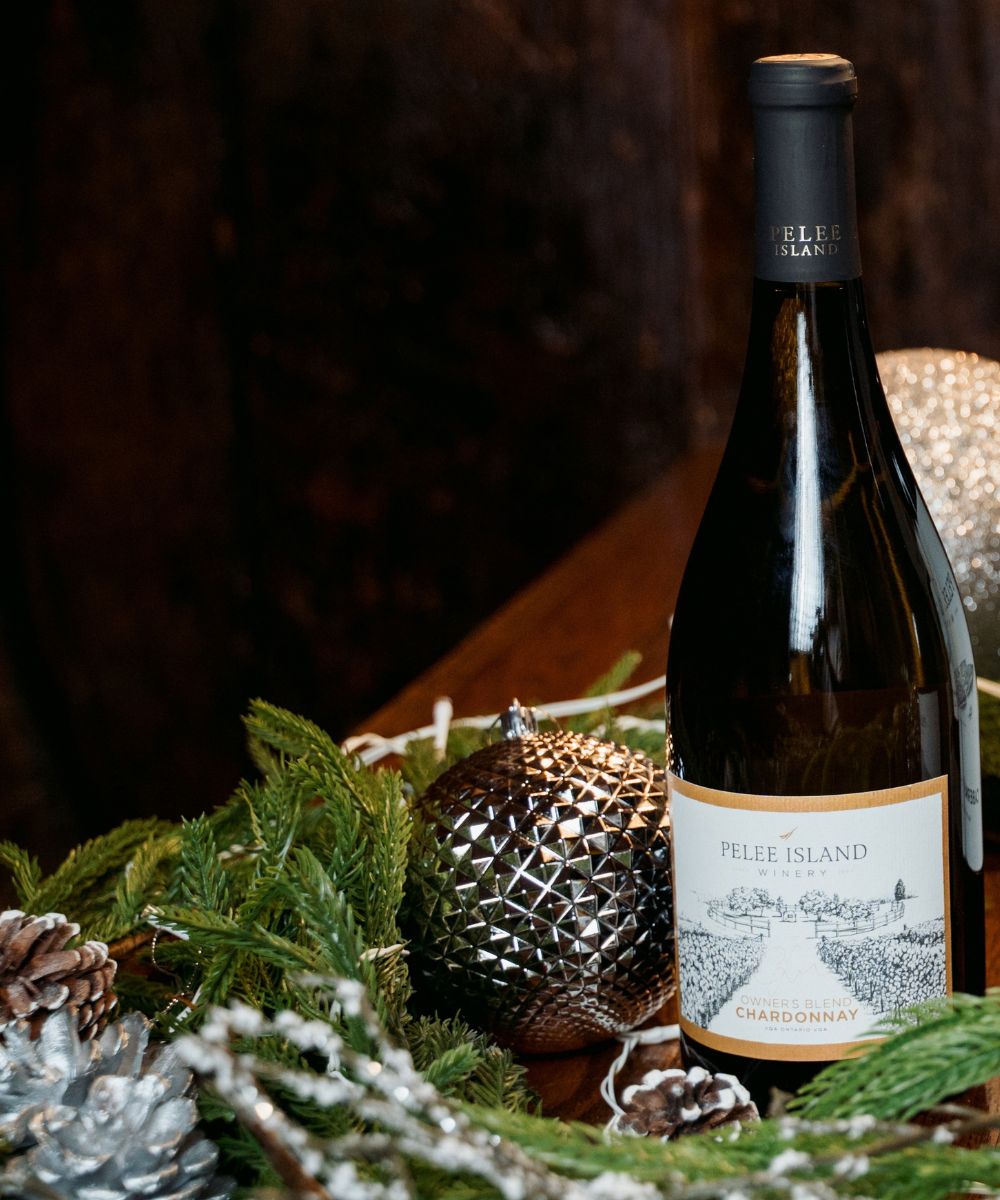 Bottle of Owner's Blend Chardonnay with the Holiday Decoration